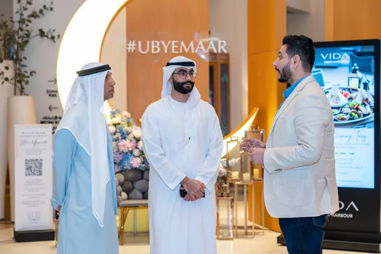 Best Solution consultants with clients at a Dubai business event