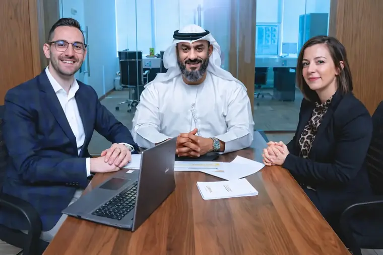 Founder Essa Al Harthi in a client meeting